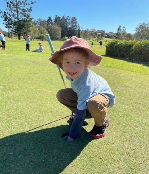 Playing golf for sport.