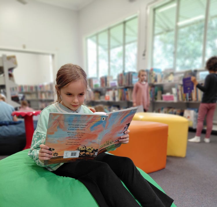 Student on bean bag reading